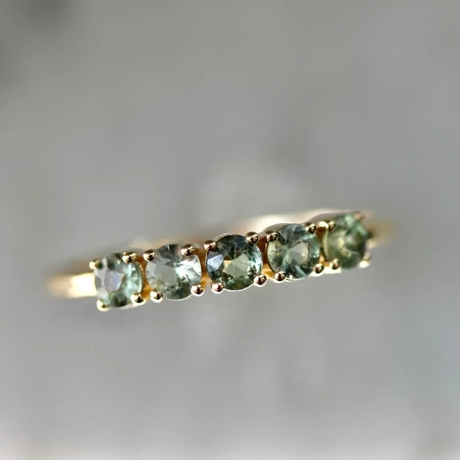 First Class Green Round Brilliant Cut Sapphire Band